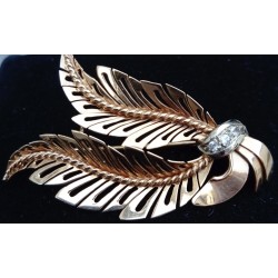 YELLOW AND WHITE GOLD BROOCH - 18 CARATS