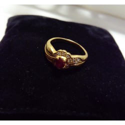 YELLOW GOLD RING - 18 CARATS - RUBY AND 9 BRILLIANTS