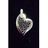 WHITE GOLD PENDANT - HEART ADORNED WITH 44 SAPPHIRES AND 7 GLOSSES ON THE BELLIERE