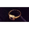 RING IN YELLOW GOLD - 18 CARATS - CENTRAL SAPPHIRE OF 4 X 3 MM AND 14 GLOSSES OF 0.01 CARAT EACH - SIZE 52