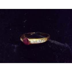 RING IN YELLOW GOLD - 18 CARATS - CENTRAL RUBY OF 4 X 3 MM AND 10 GLOSSES OF 0.01 CARAT EACH - SIZE 54