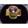 YELLOW GOLD RING - 18 CARATS - AMETHYST OF 10 X 8 MM AND PERIDOT OF 4 X 6 mm - SIZE 54